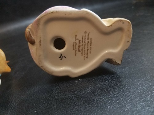 HUNCA MUNCA FIGURINE FROM BEATRIX POTTER COLLECTION and HUNCA MUNCA sweeping