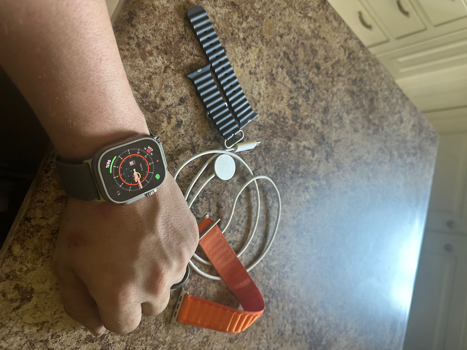 Apple Watch Ultra 49mm Titanium Case with Orange Alpine Loop Apple Watch Ultra 49mm Titanium Case with Orange Alpine Loop