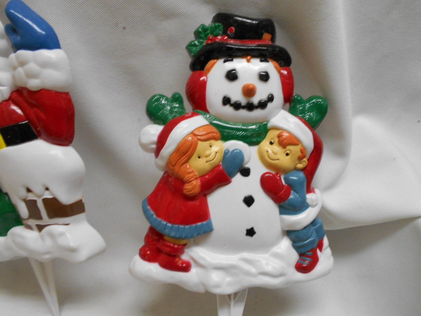 2 hard plastic outdoor stakes Christmas decorations Santa Claus waving snowman