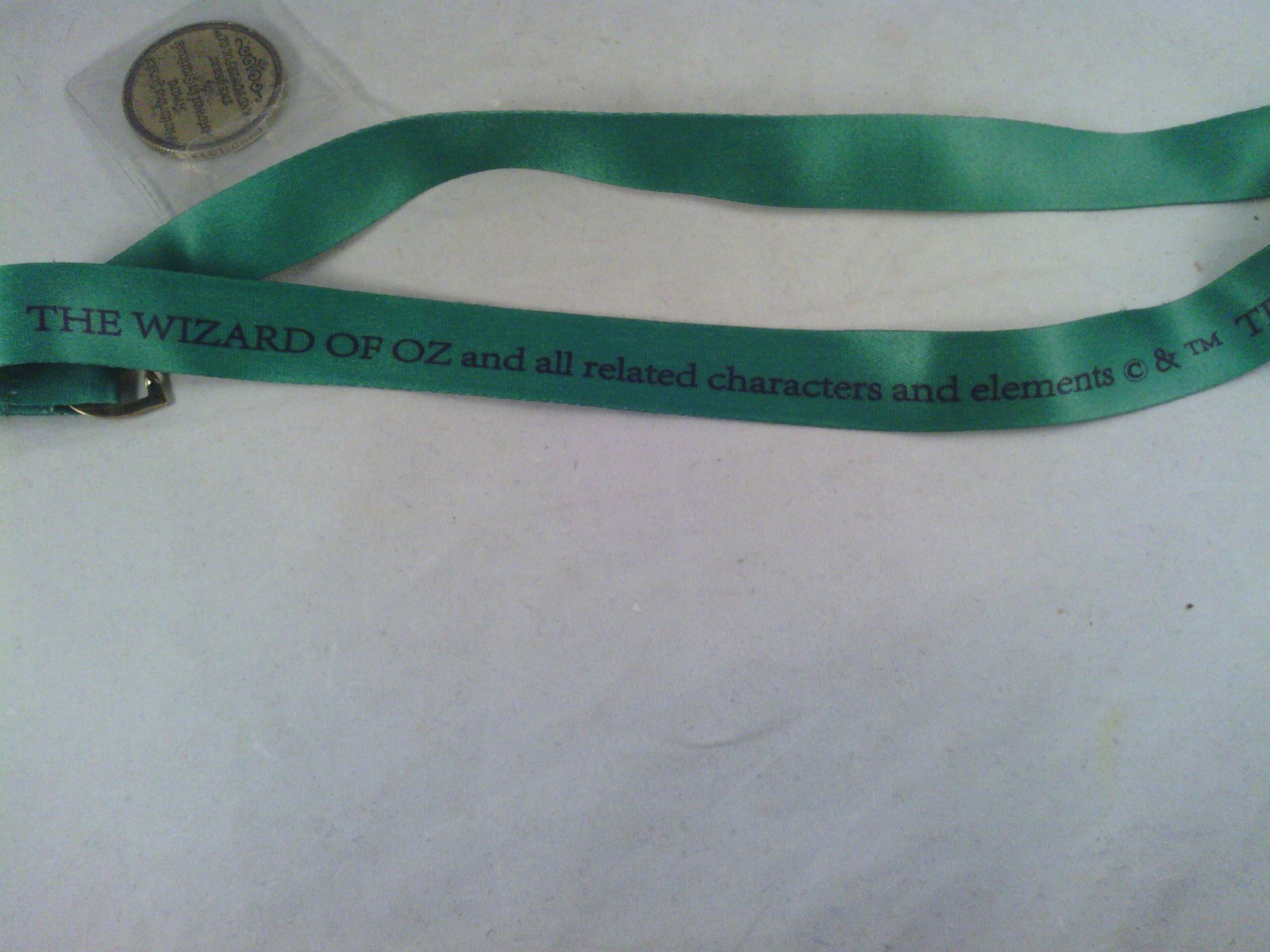 Wizard of Oz Train ride Lanyard with Maritoriuos Service award coin. Green