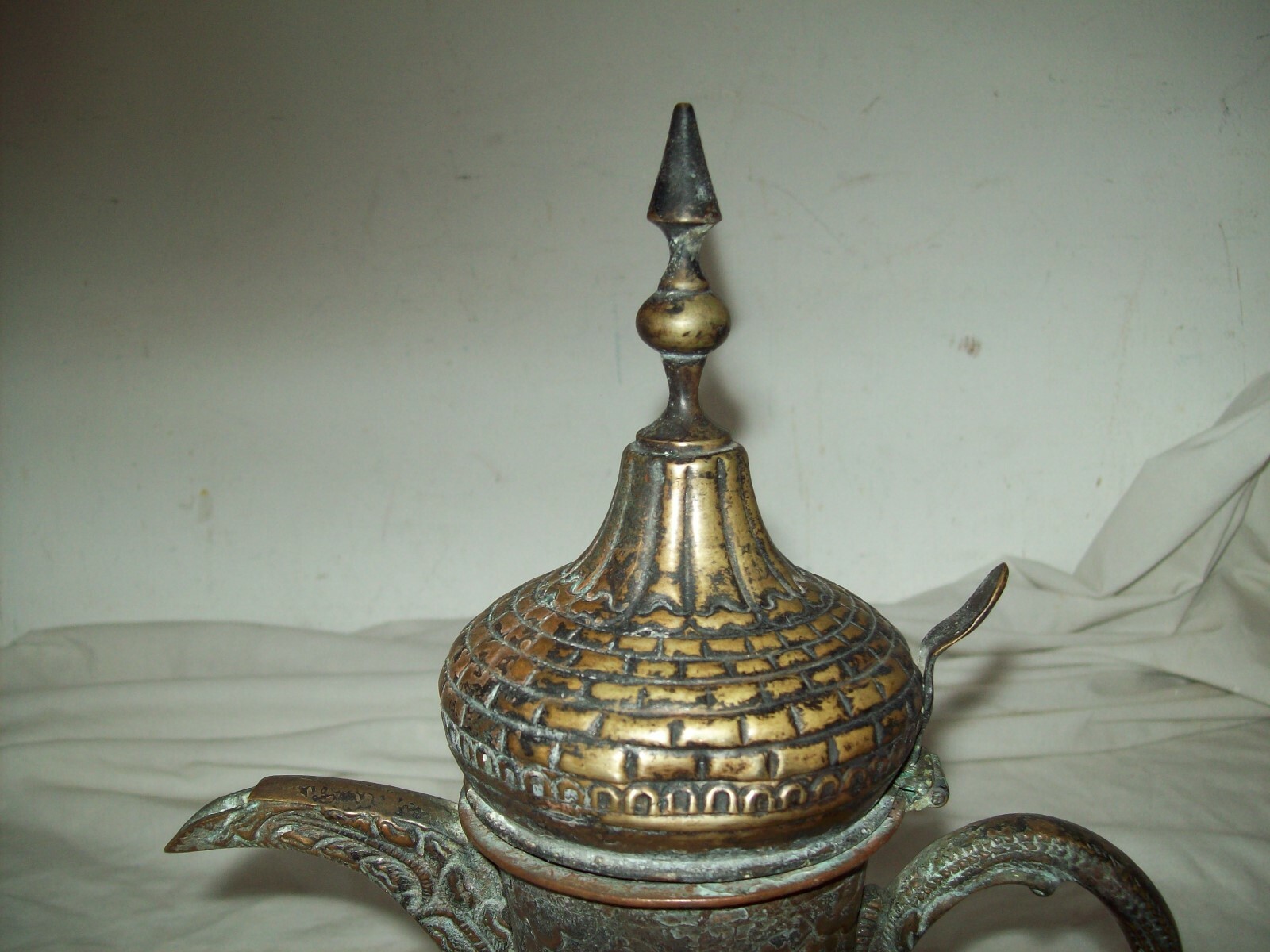 antique  Islamic copper Dallah coffe pot with embossed mosque design