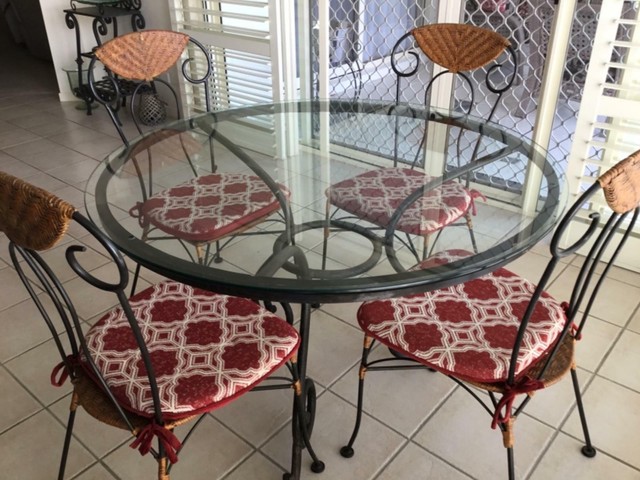 Wrought iron and glass round table with 4 chairs and pads | Dining