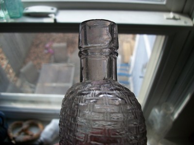 FANCY 1/2 PINT BASKETWEAVE POCKET FLASK LIGHT SUN COLORED AMETHYST 1890S ERA