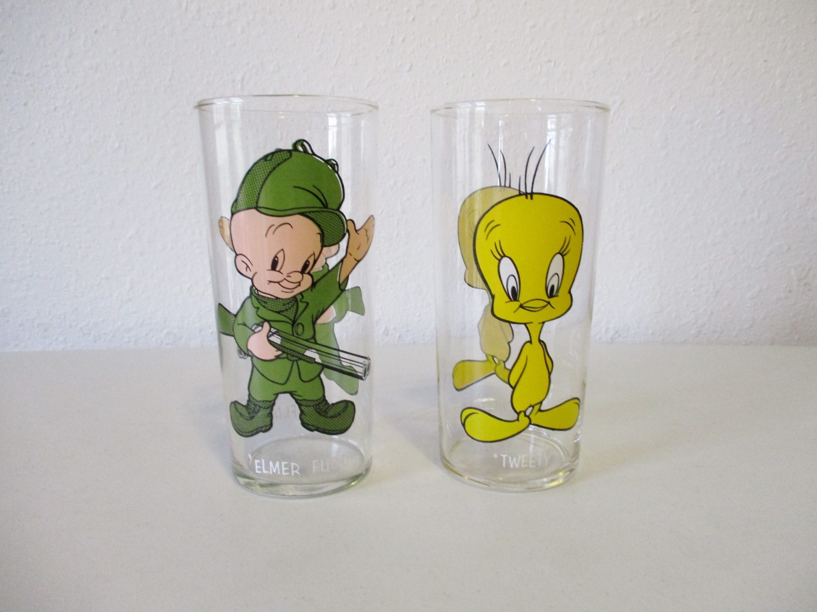 2- 1973 Pepsi Warner Bros Glasses-Elmer Fudd & Tweety Bird, Thin Glass