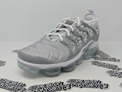 white and grey vapormax plus