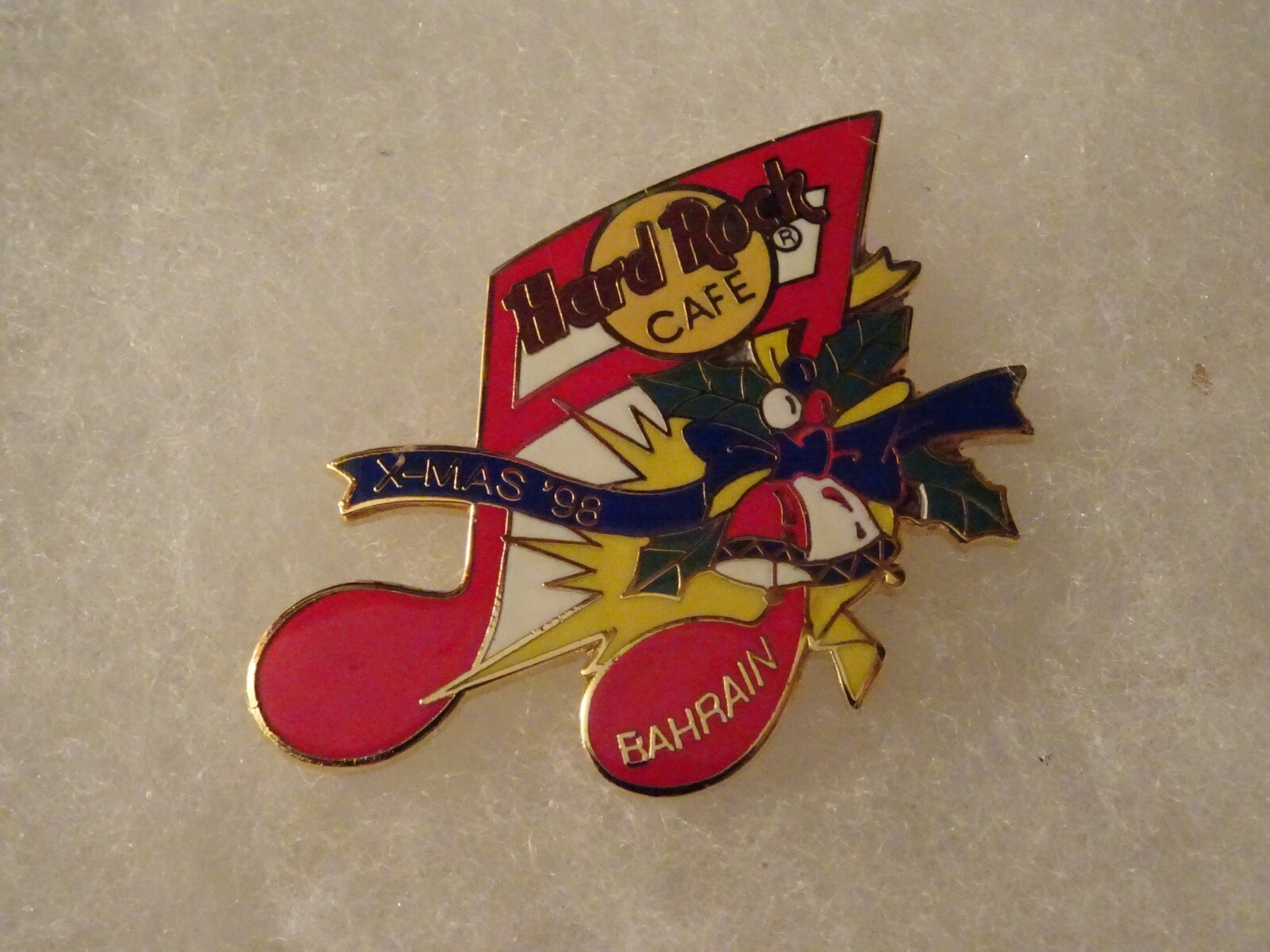 Hard Rock Cafe pin Bahrain red musical Note with Bells and Holly Christmas 1998 Hard Rock Cafe pin Bahrain red musical Note with Bells and Holly Christmas 1998