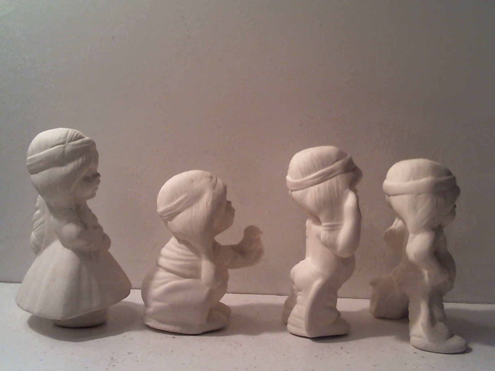 American Indian 2 Maidens & 2 Braves Ceramic Bisque Figurines Unpainted