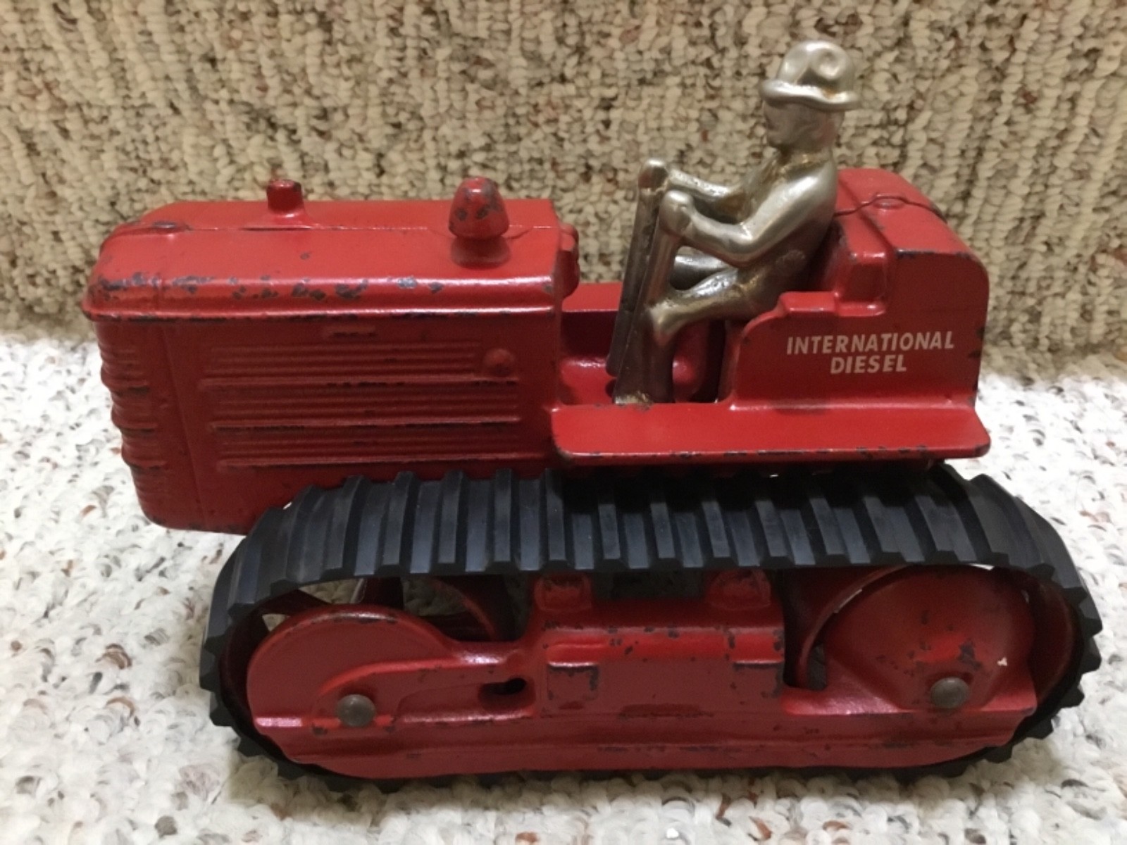 Vintage Arcade Cast Iron International Harvestor Crawler Toy with Nickel Man