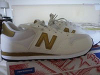 new balance bianche e oro