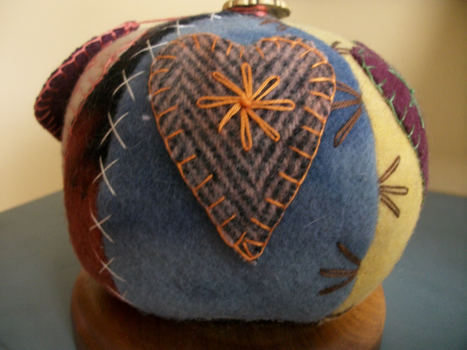 Large Wool Pin Cushion Hand Stitched on Wooded Base Fancy Stitches Hearts Nice!
