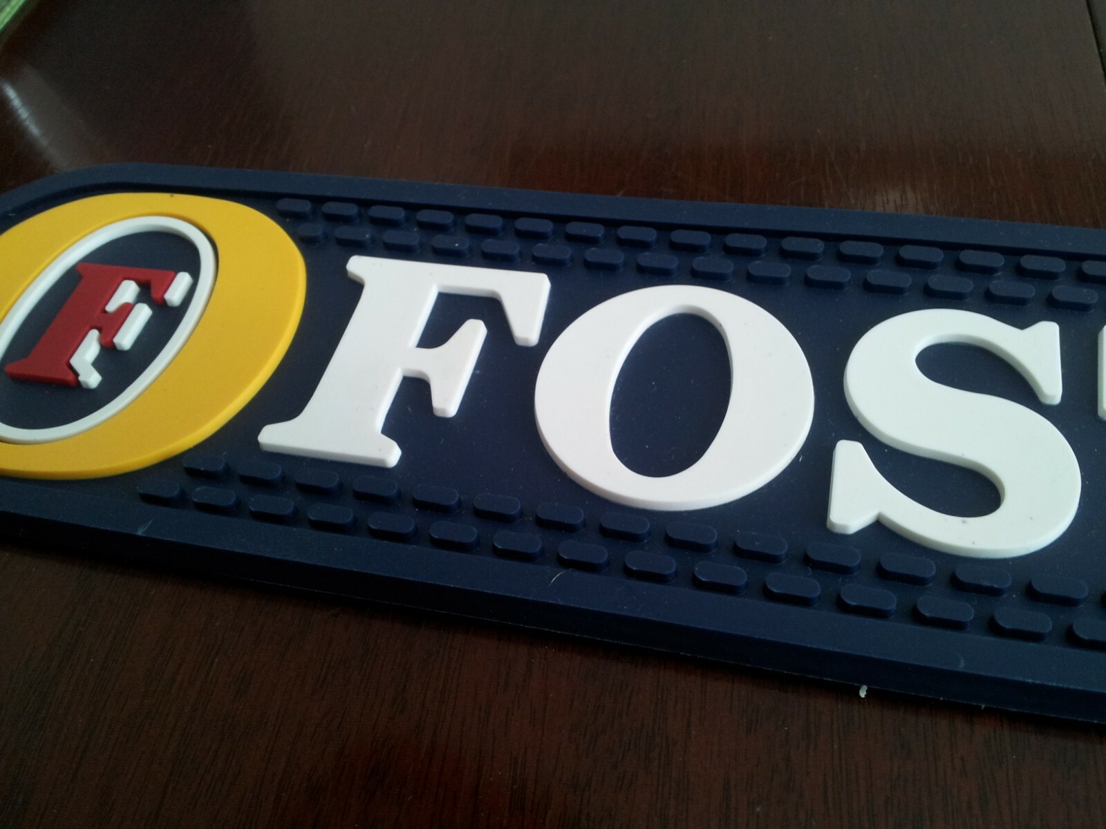 Foster's rubber beer drip mat - brand new