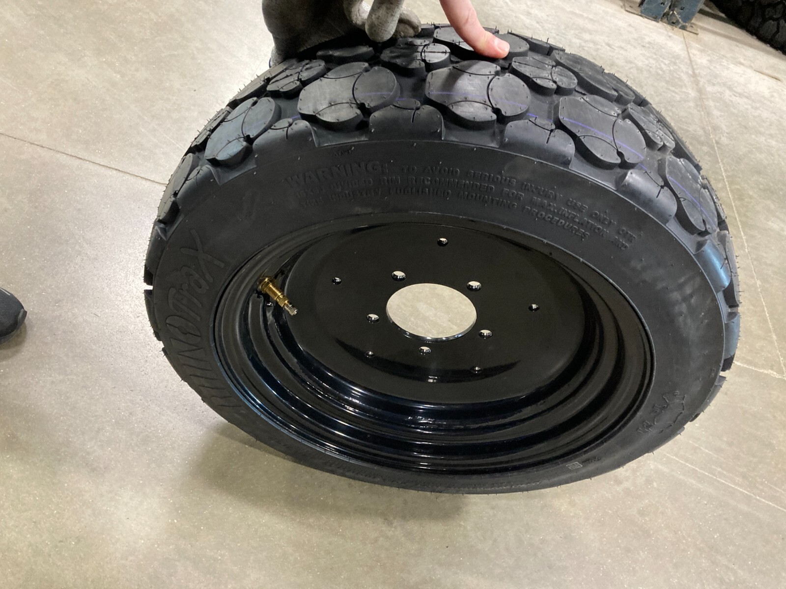 New Foam Filled Tire on Rim 25x7.00-16 OTR RhinoAG Trax 8Ply New Foam Filled Tire on Rim 25x7.00-16 OTR RhinoAG Trax 8Ply
