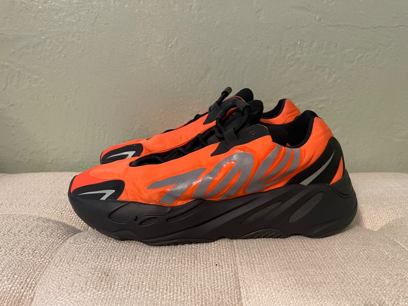 black and orange yeezy 700