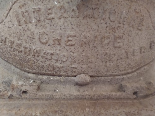 ANTIQUE CAST IRON ONEPIPE INTERNATIONAL HEATERS FRONT UTICA NY  Steampunk decor