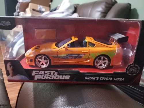 ①Jada Toys1/55 FAST＆FURIOUS 6台セット① 1995 TOYOTA SUPRA ORANGE W/LIGHTS & BRIAN FIGURE FAST