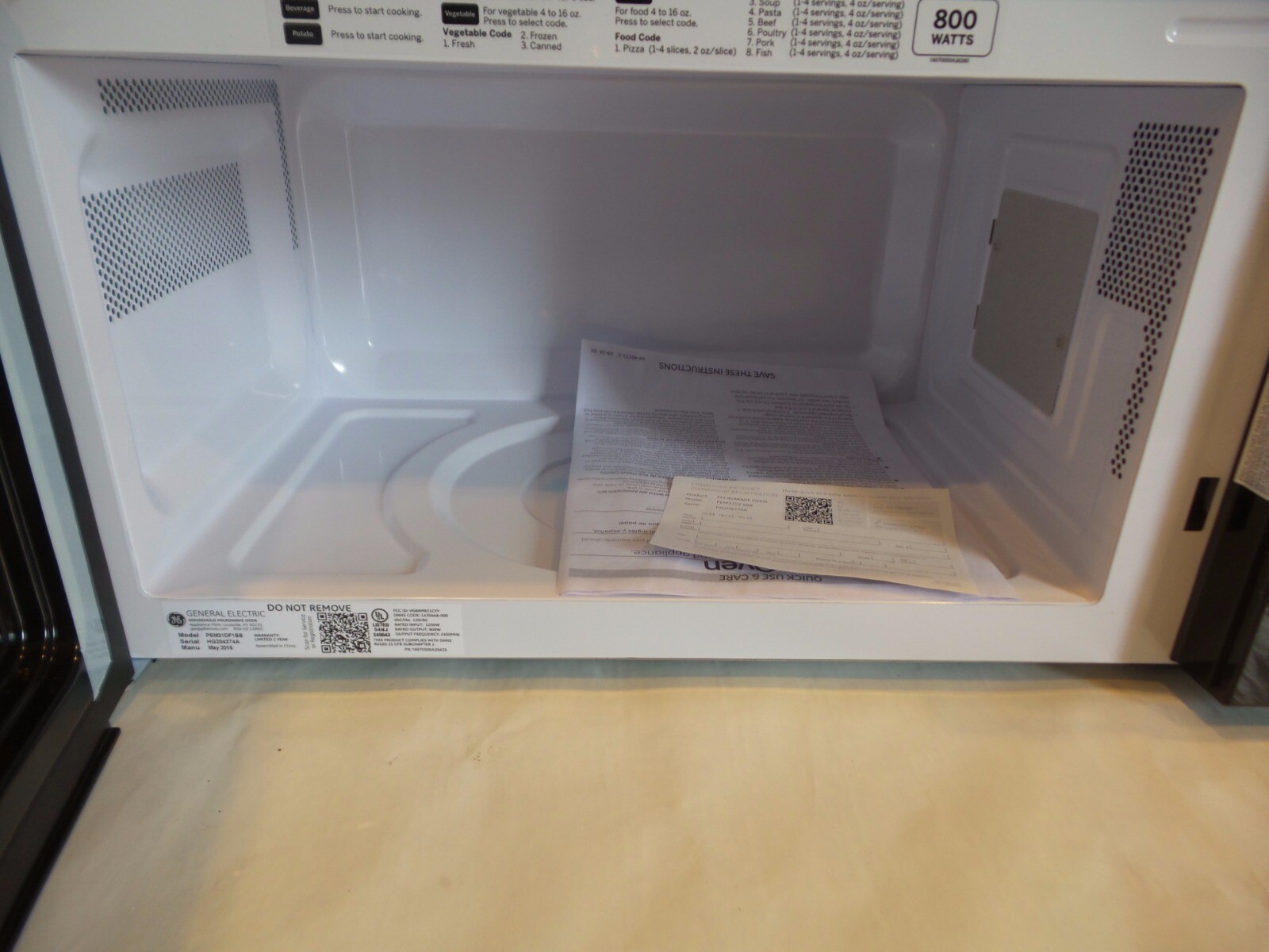 GE PEM31DFBB Profile Series - 1.1 CF. 800W Black-on-Black COUNTERTOP Microwave