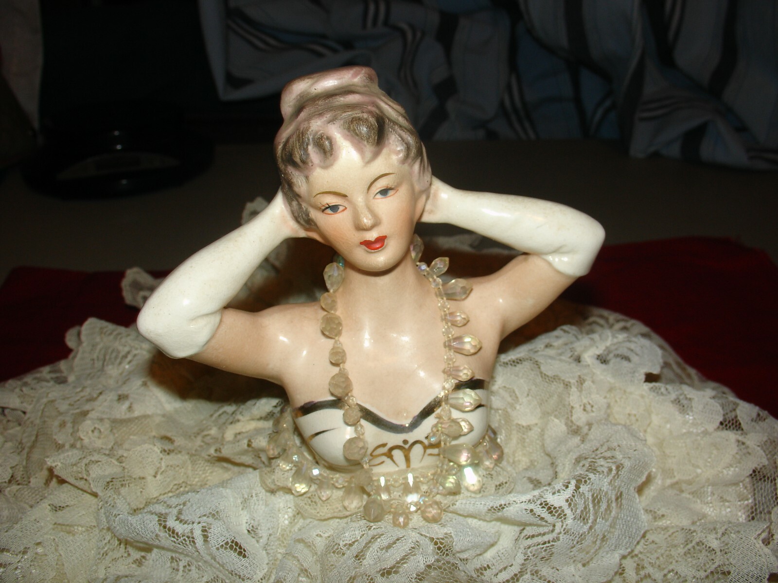 vintage porcelain 7 inch half doll with dress/necklace