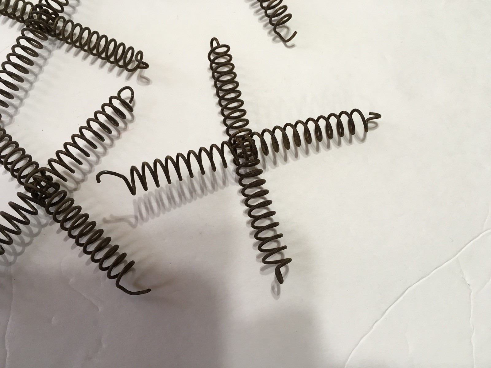 25 metal steel bed spring coil  X shape  4.5 long steampunk repurpose vintage