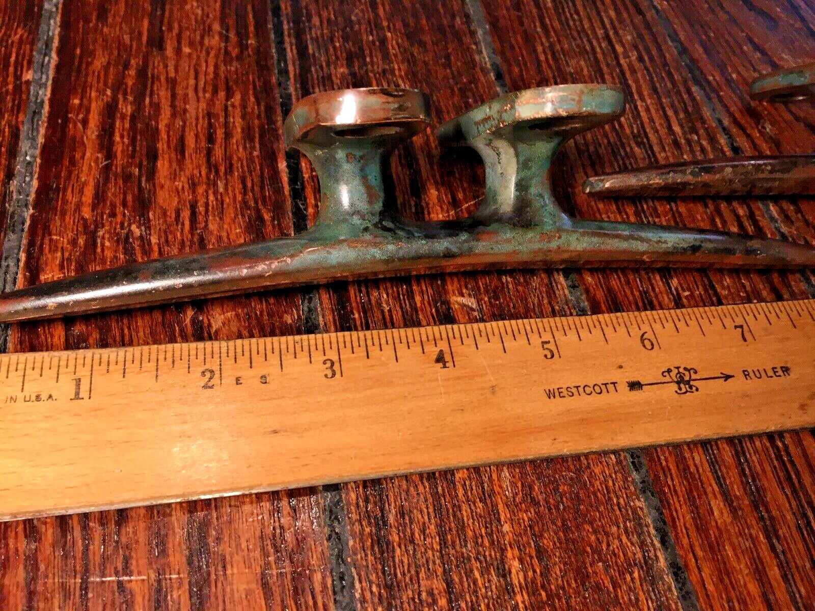 PAIR OF VINTAGE SOLID BRONZE CLEATS 8