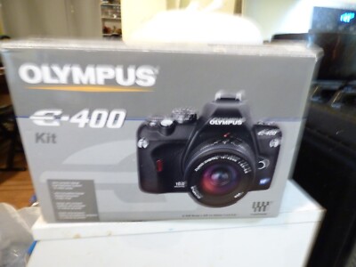 Olympus e-400 with 10MP Kodak CCD on 4/3 sensor. The shutter count is only 3201.