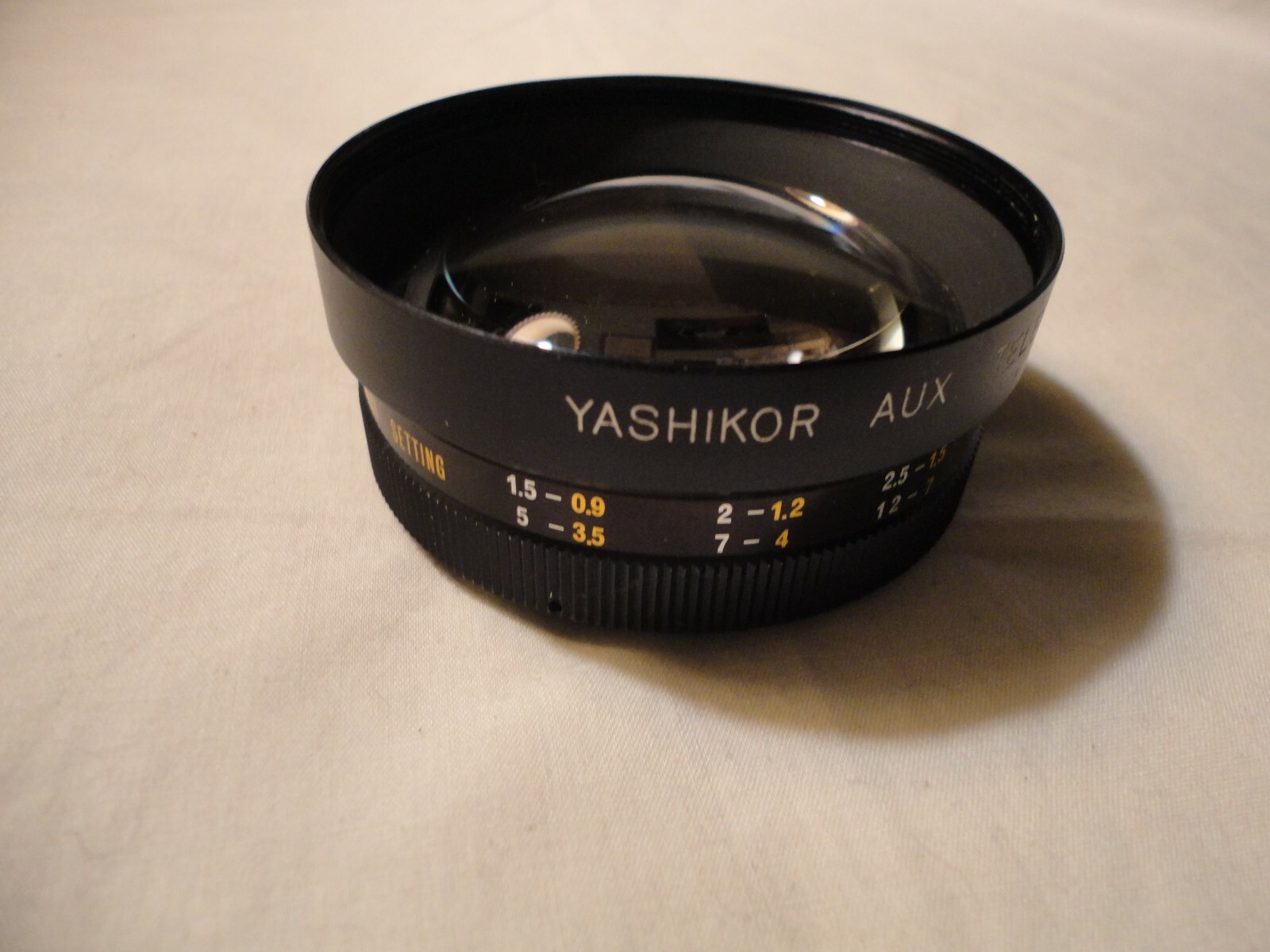 Yashikor Y909  1:4 Auxillary Telephoto Lens With Caps