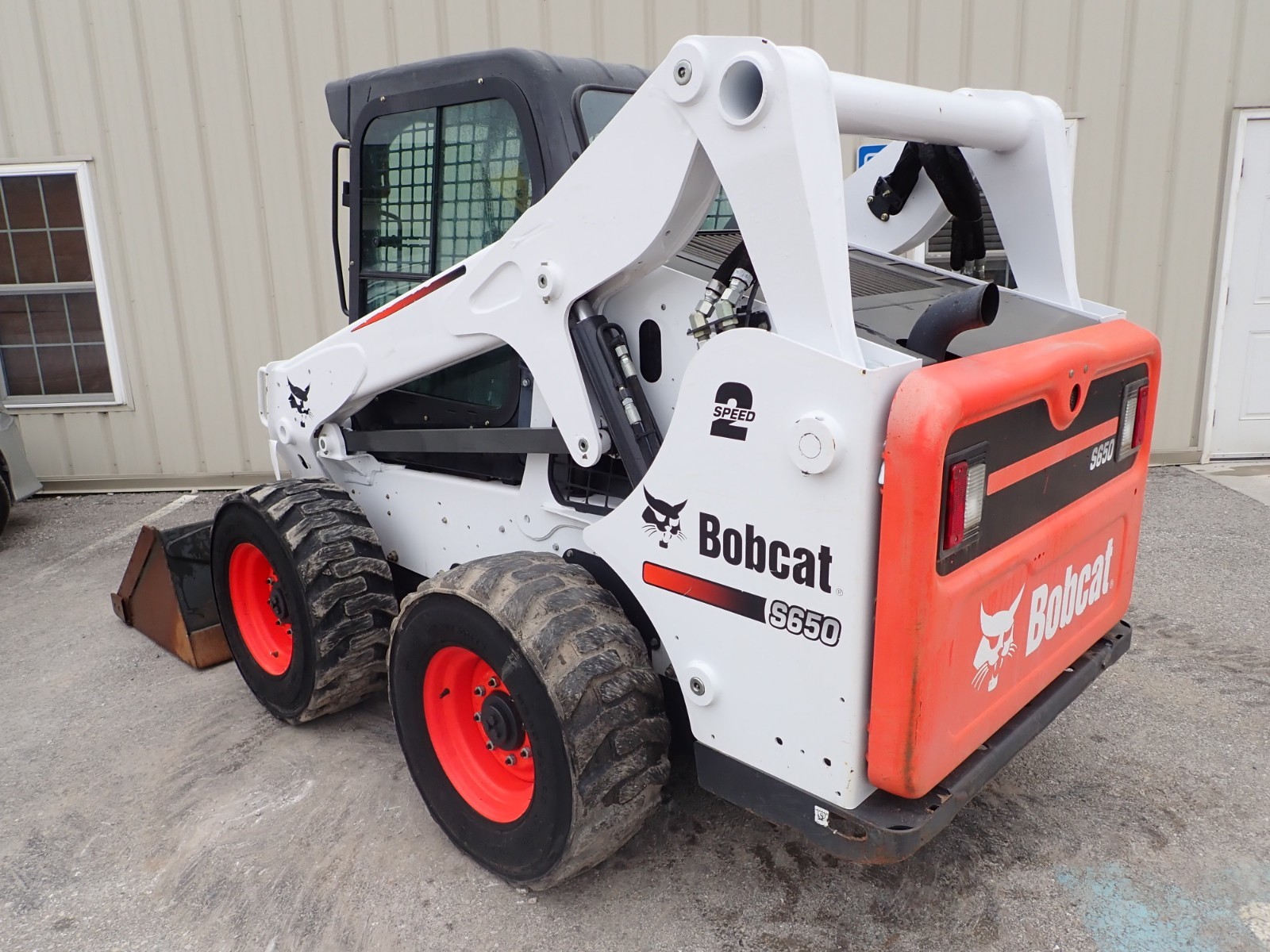 2015 BOBCAT S650 SKID STEER, EROPS, HEAT/AC, 2SPD, AUX HYDRAULICS, POWER BOBTACH