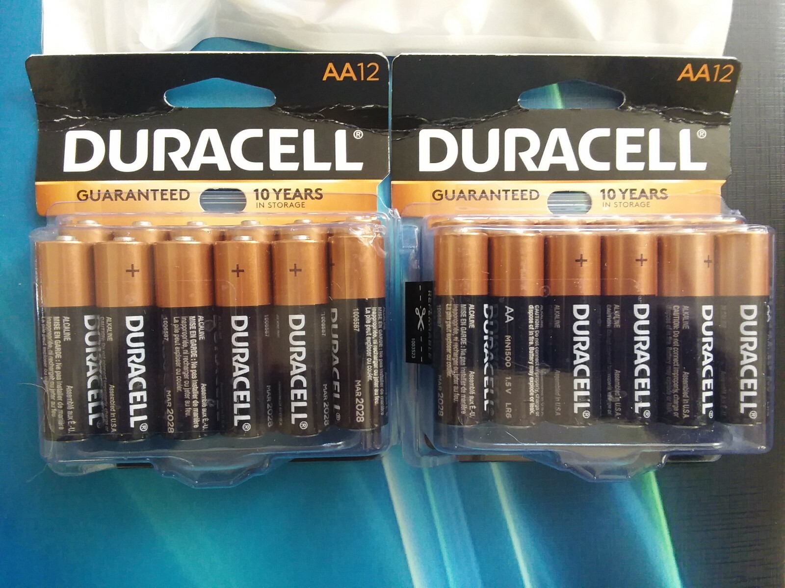 24 AA DURACELL Coppertop - 2pks x12= 24 Batteries, exp 2028 With Battery Tester!