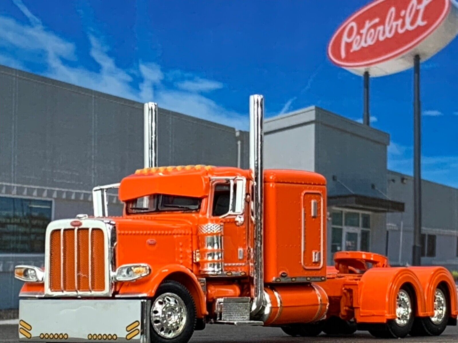 1/64 DCP ORANGE PETERBILT 389 W/ 63" FLAT TOP SLEEPER