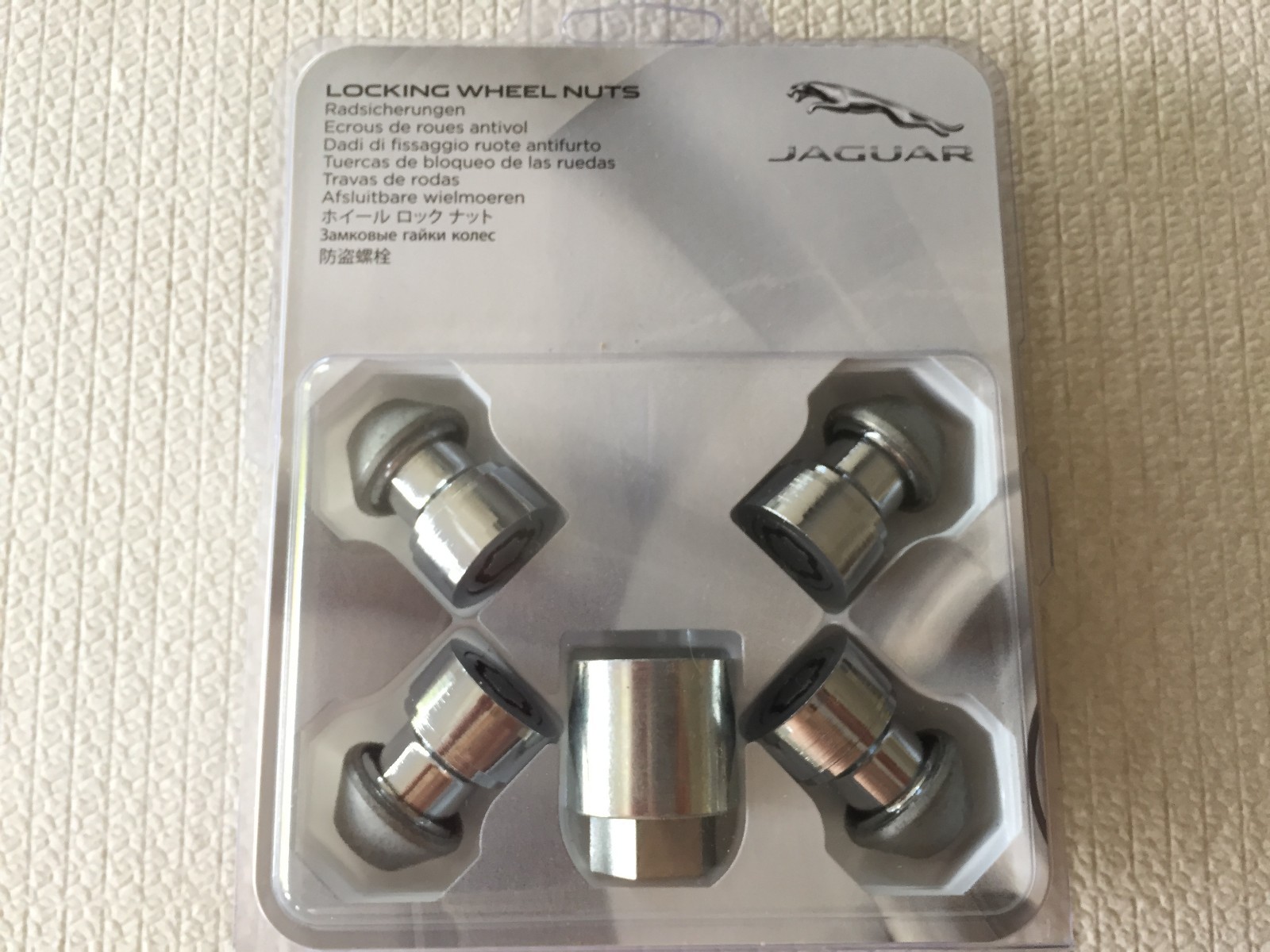 GENUINE JAGUAR F-PACE LOCKING WHEEL NUT SET CHROME NEW