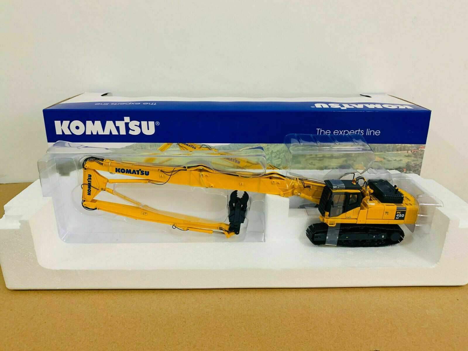 Komatsu PC450 LCD W/Long Tongs Excavator 1:50 Scale Die-Cast Komatsu PC450 LCD W/Long Tongs Excavator 1:50 Scale Die-Cast