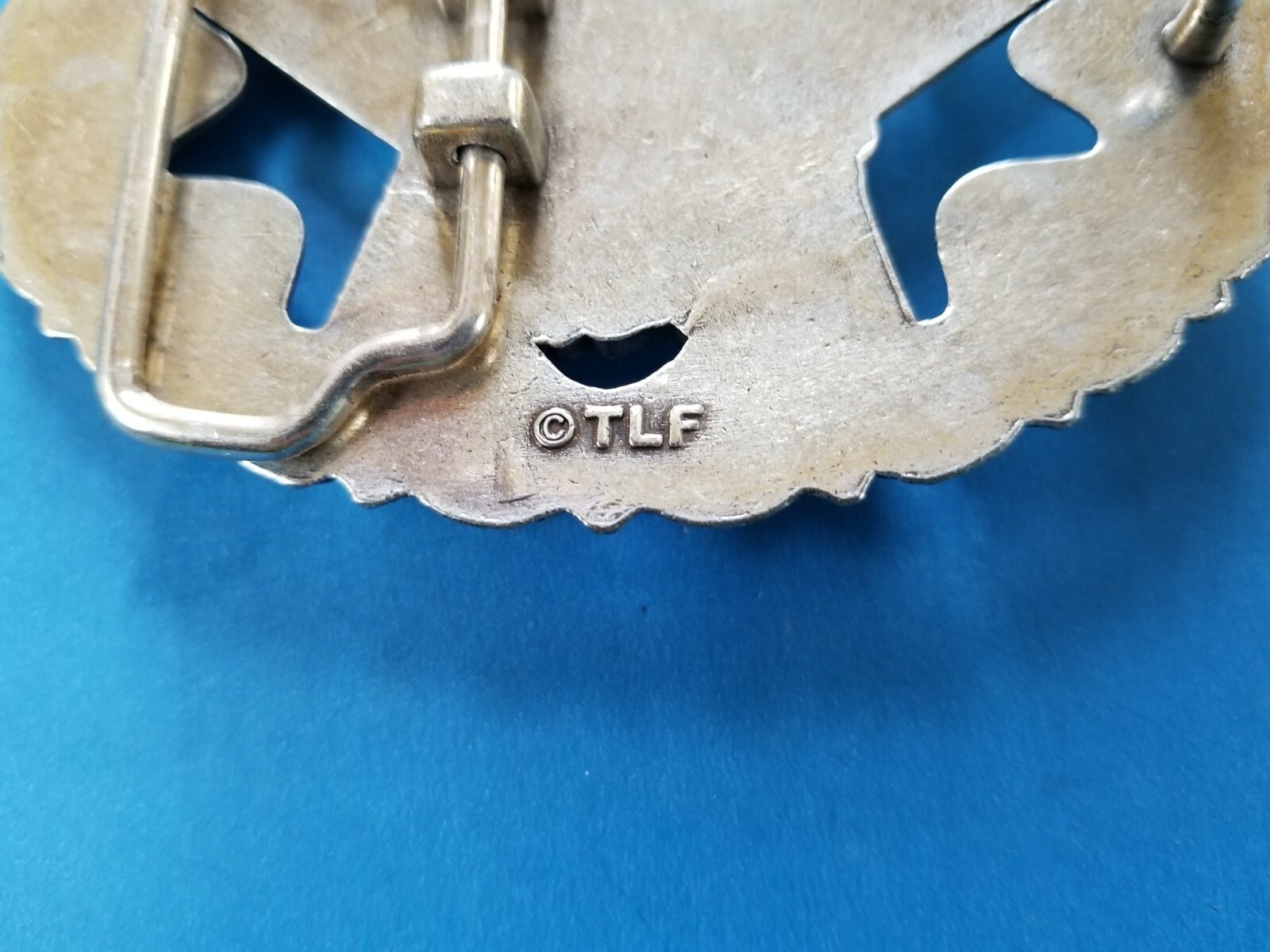 Eagle Head on 5 Point Star Belt Buckle Scrollwork Border Silver and Gold Tones