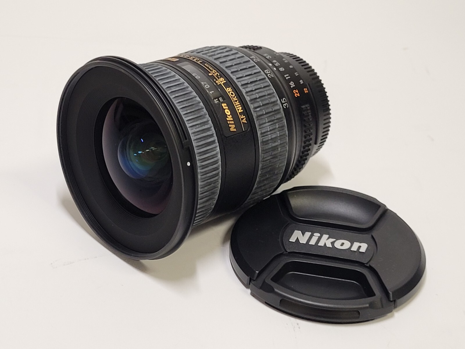 NIKON NIKKOR AF 18-35mm f3.5-4.5 D IF-ED LENS w/ CAPS and NIKON NIKKOR AF 18-35mm f3.5-4.5 D IF-ED LENS w/ CAPS and