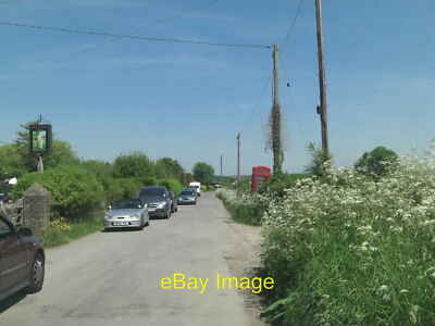 Photo 12x8 The Village beside The Cricketers Berwick The slightly curious  c2012