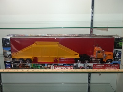 1/32 RAY KENWORTH SEMI WITH DAY CAB BOTTOM DUMP YELLOW/ORANGE