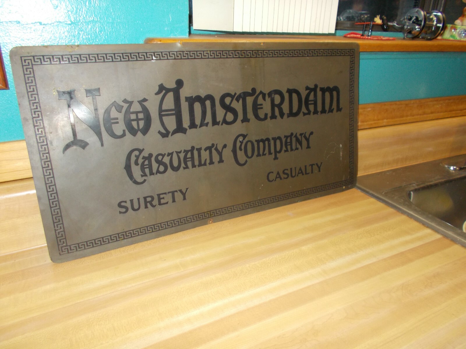 Old AMSTERDAM CASUALTY COMPANY Insurance Co Advert Sign Brass