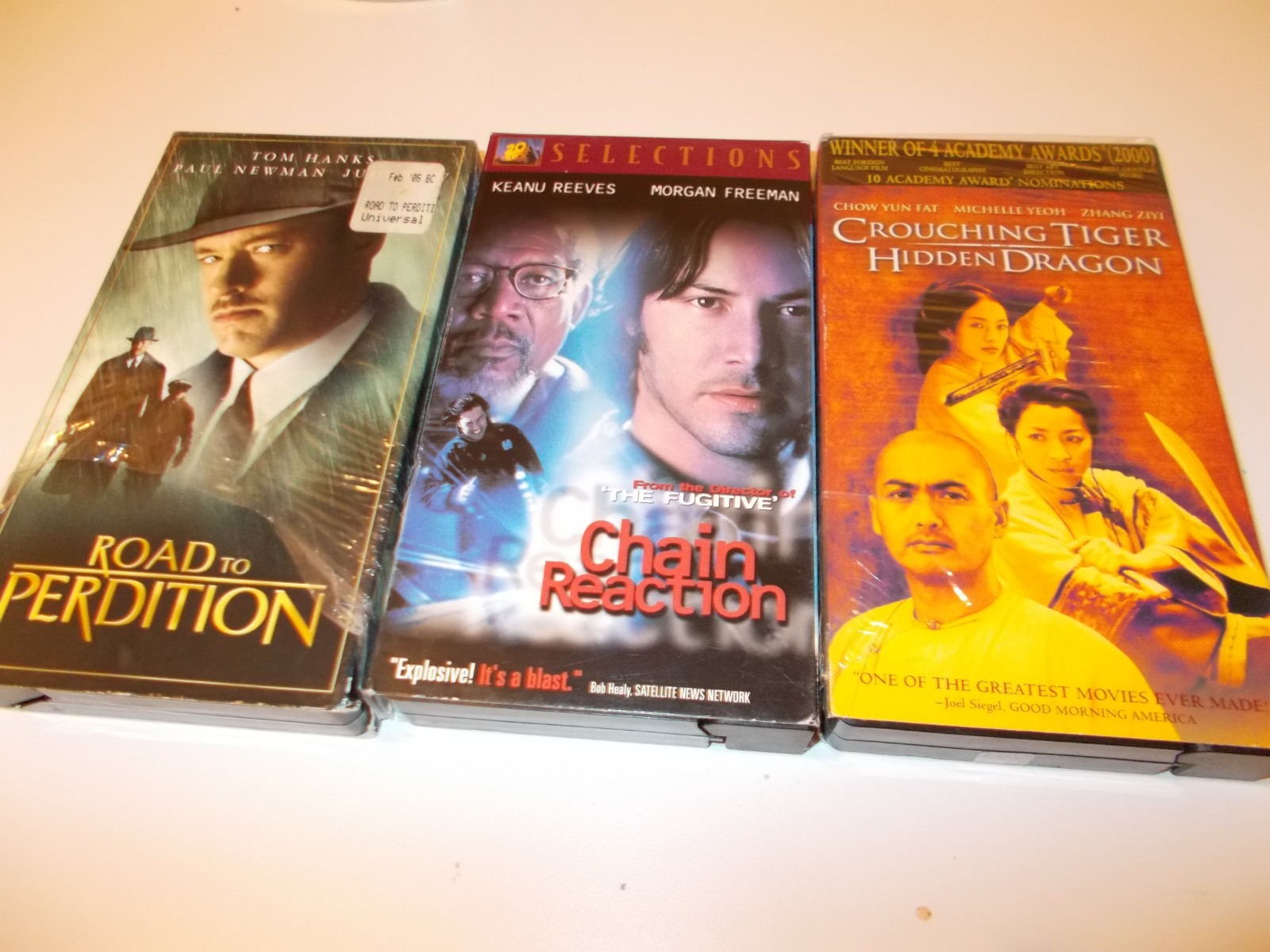 Road to perdition ,chain reaction,Crouching Tiger Hidden Dragon  VHS Tapes