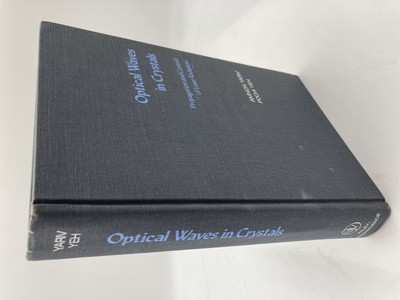 Optical Waves in Crystals: Propagation and Control of Laser Radiation