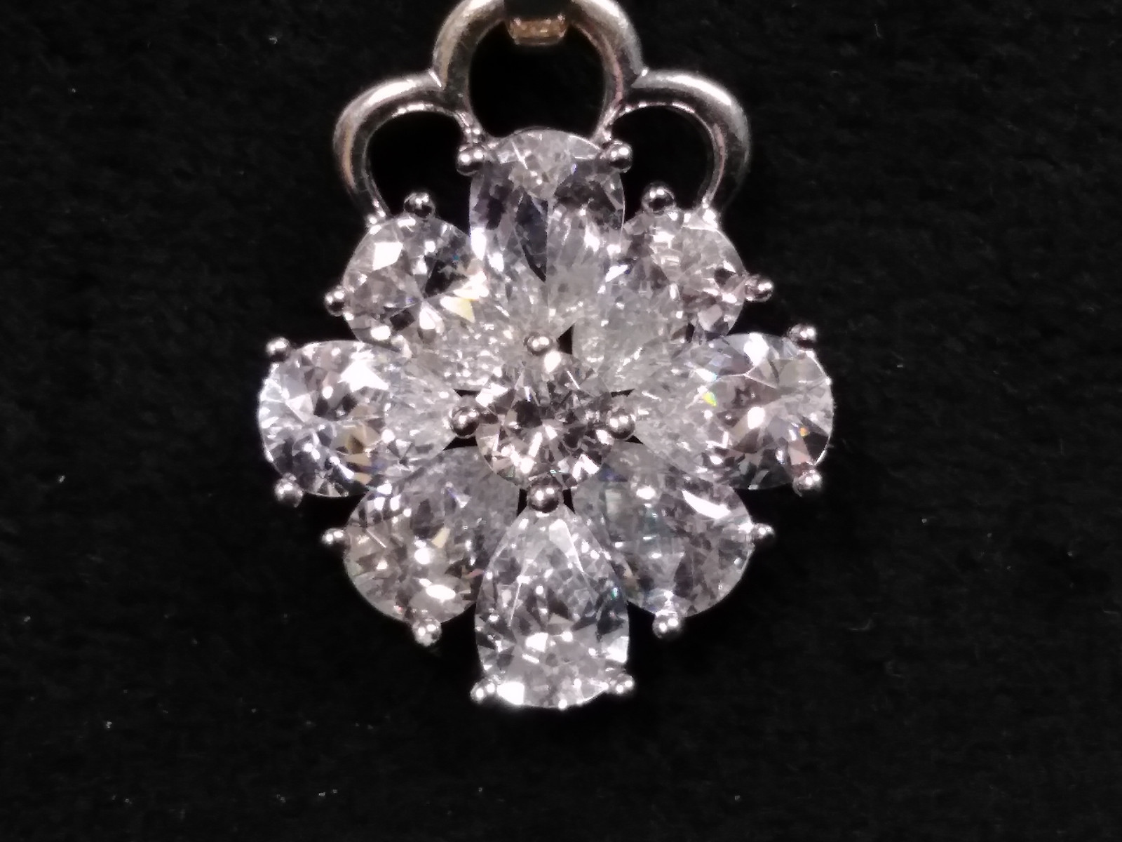 Sterling Silver and Cubic Zirconia Matching Ring and Pendant Floral Set