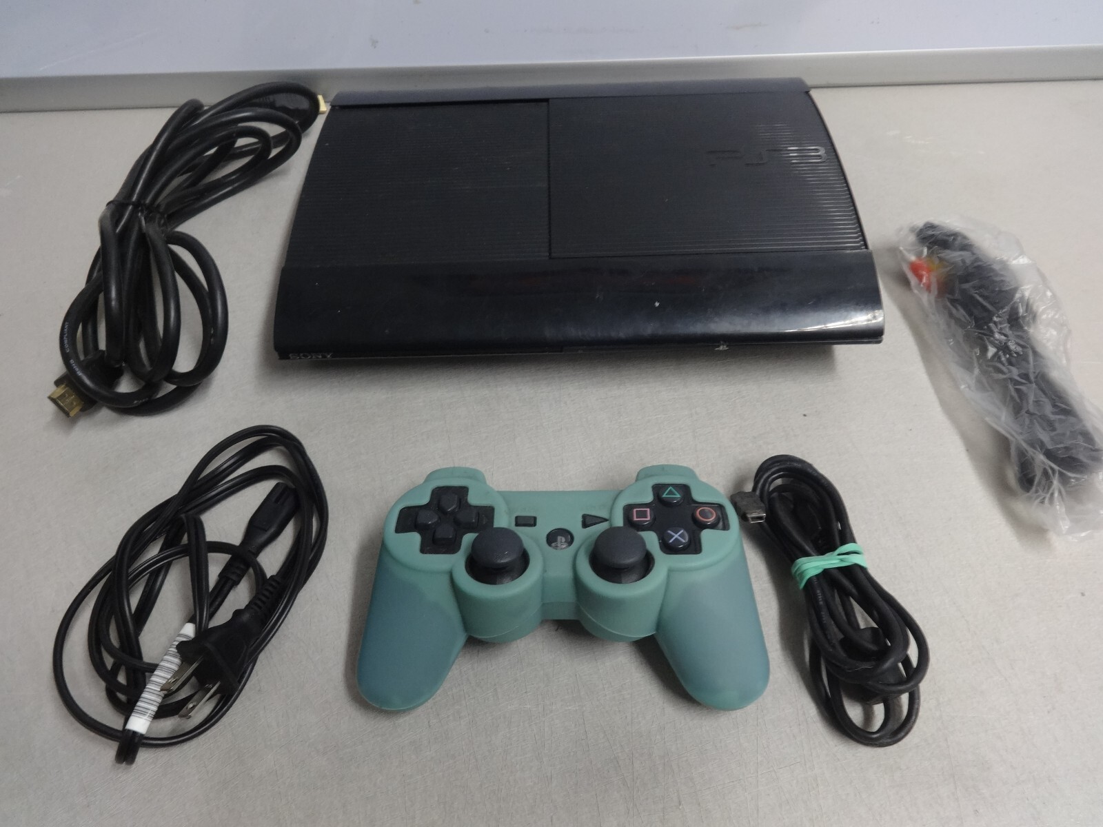 PS3 Super Slim 500GB CONSOLE BUNDLE - Black Plus 1 PS3 Super Slim 500GB CONSOLE BUNDLE - Black Plus 1