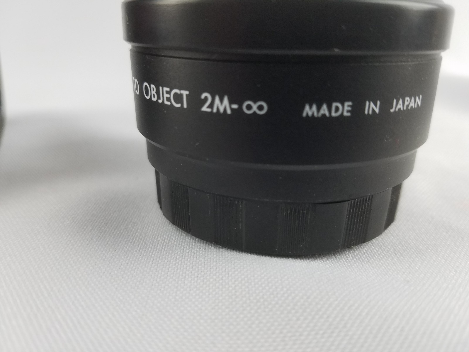 Lenmar Aux Telephoto Lens distance to oblect 2m japan