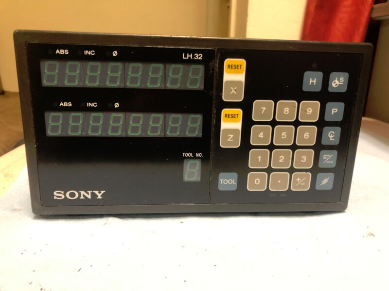 Used SONY digital readout MODEL LH32-2K ,shows error when powers no scales