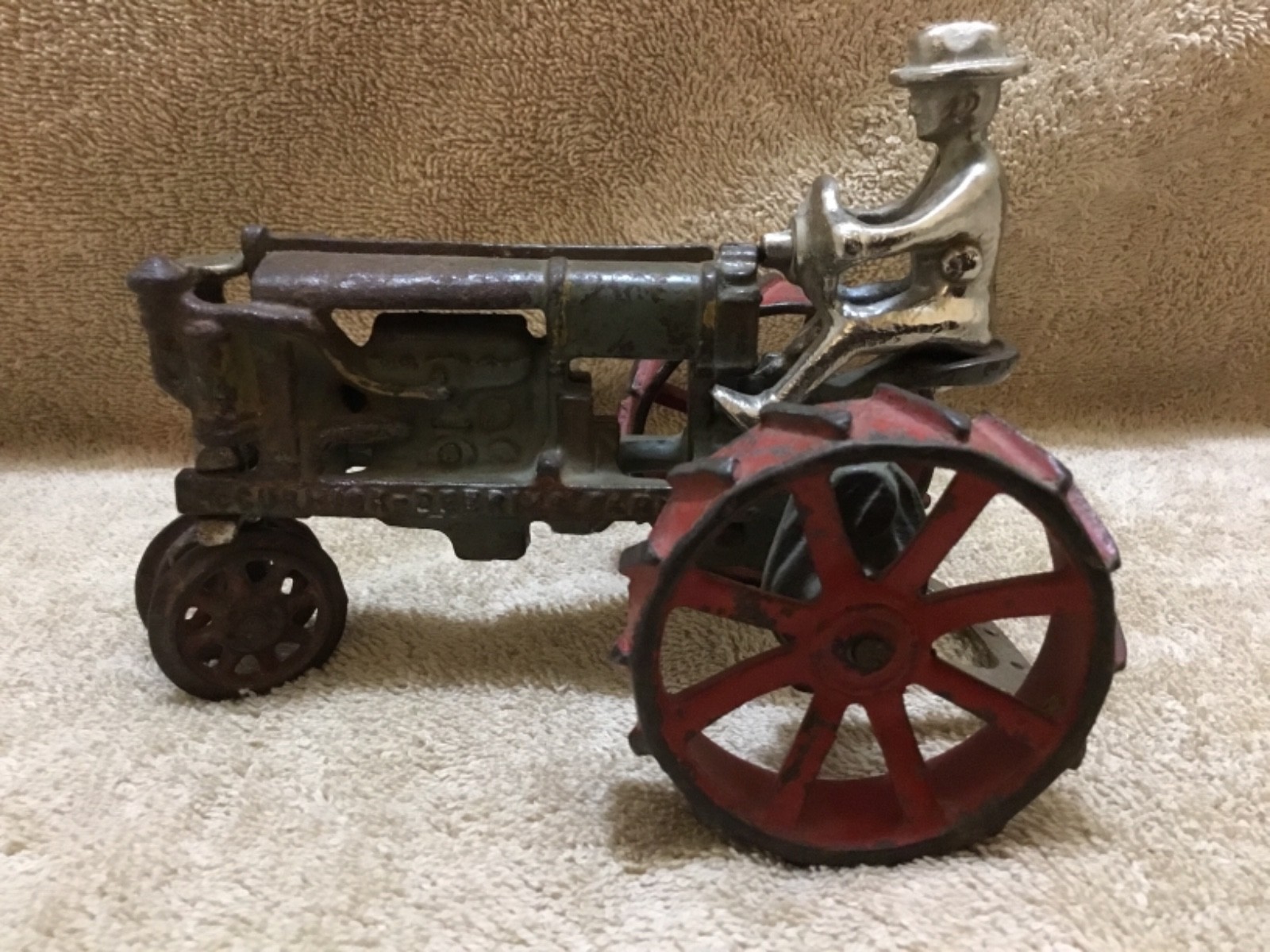 ANTIQUE ARCADE CAST IRON TOY McCORMICK  DEERING Farmall Regular Toy Tractor.