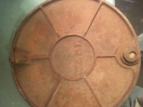 Vintage castiron ford water meter lid