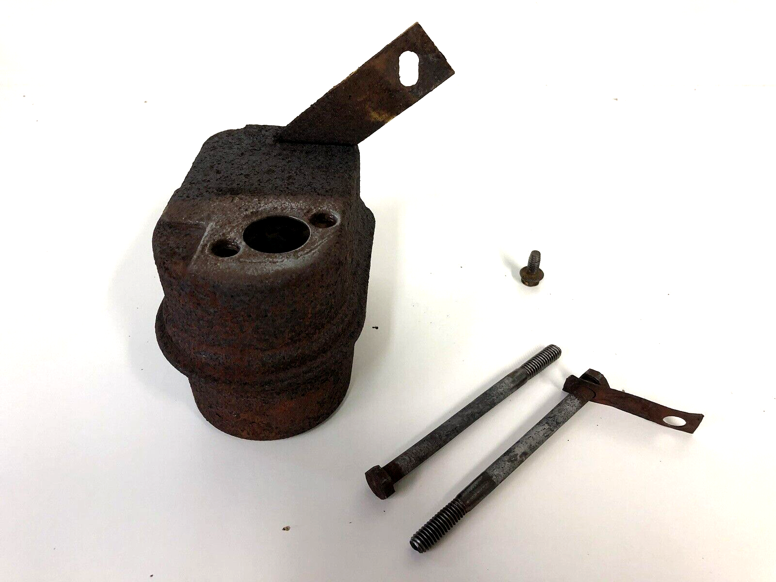 Muffler Assembly & Bolts from a Tecumseh HM80