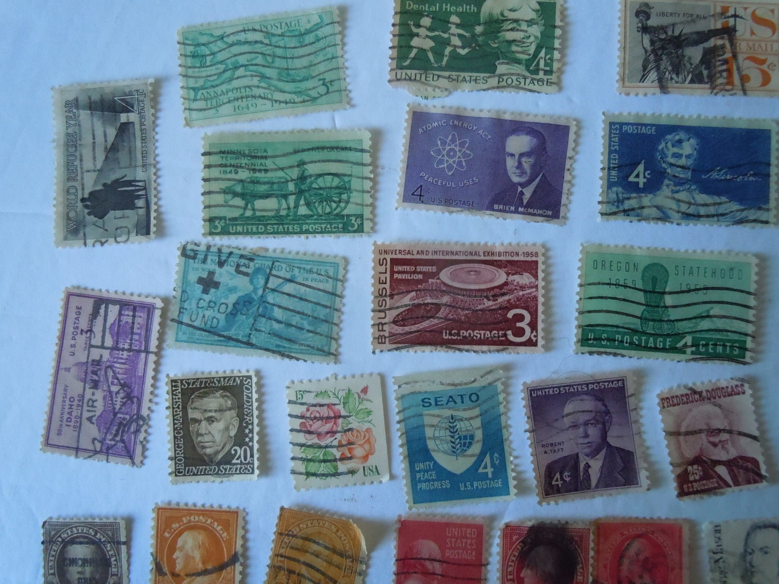 Assorted US  stamps 70 used ephemera paper collectibles lots stamp lots