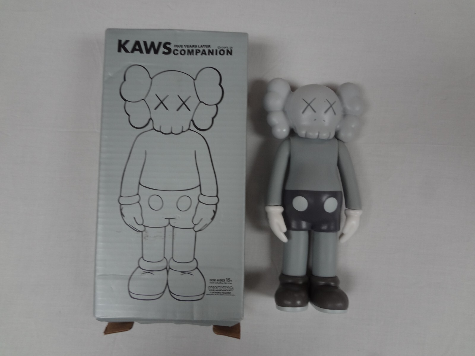 KAWS Five Years Later Companion Original Fake Vinyl Figure KAWS Five Years Later Companion Original Fake Vinyl Figure