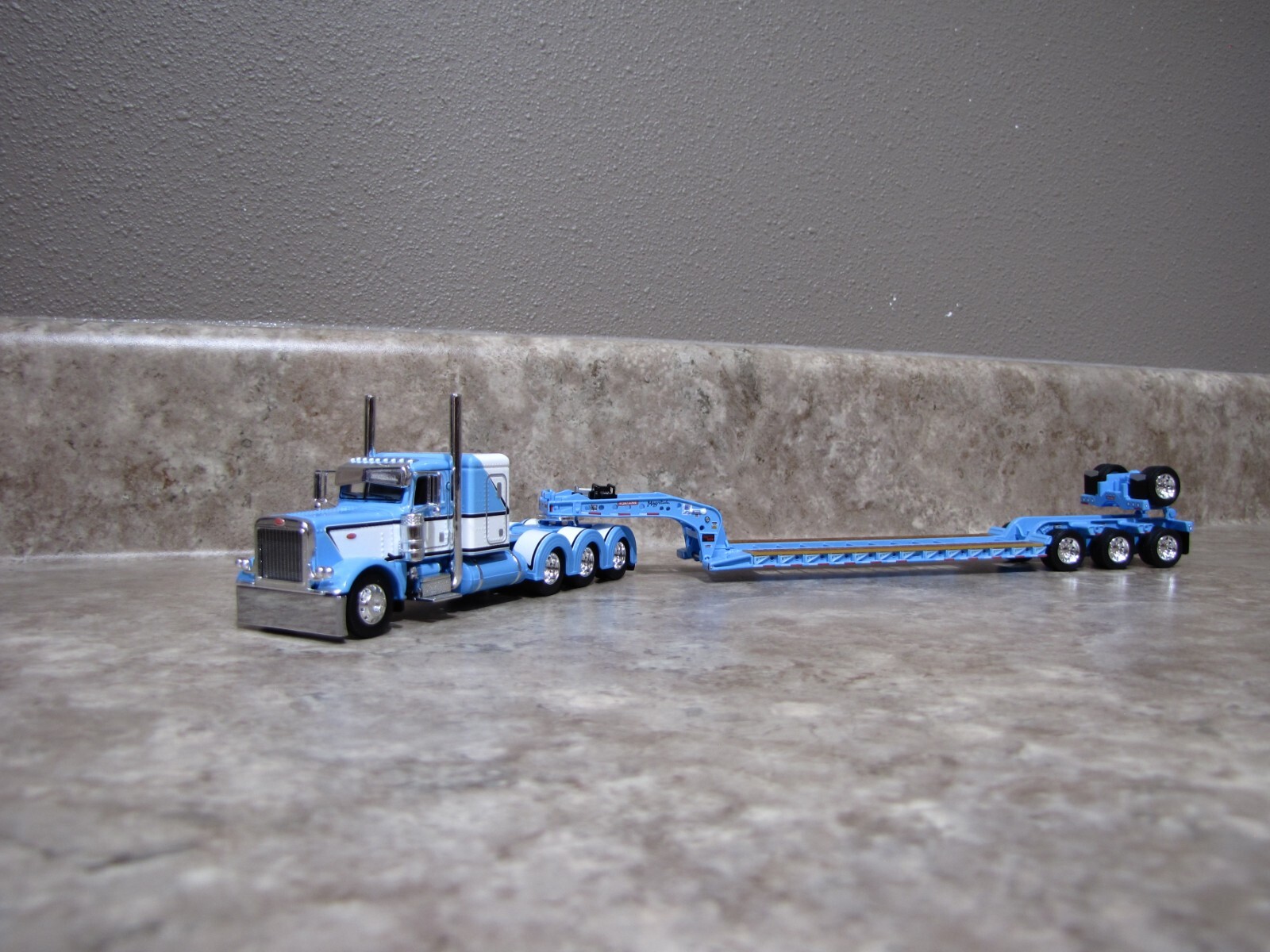 DCP 1/64 Baby Blue White Tri-Axle Peterbilt 389 Fontaine