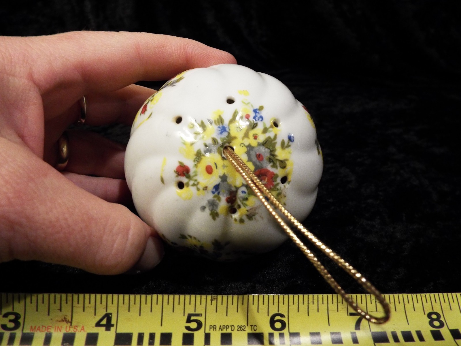 Ceramic pomander potpourri ball with yellow and red flowers