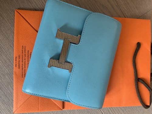 HERMÈS Constance Compact baby blue Tadelakt with lizard