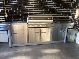 outdoor bbq kitchen with fridge